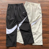 CALÇA NIKE (REFLECTIVE)